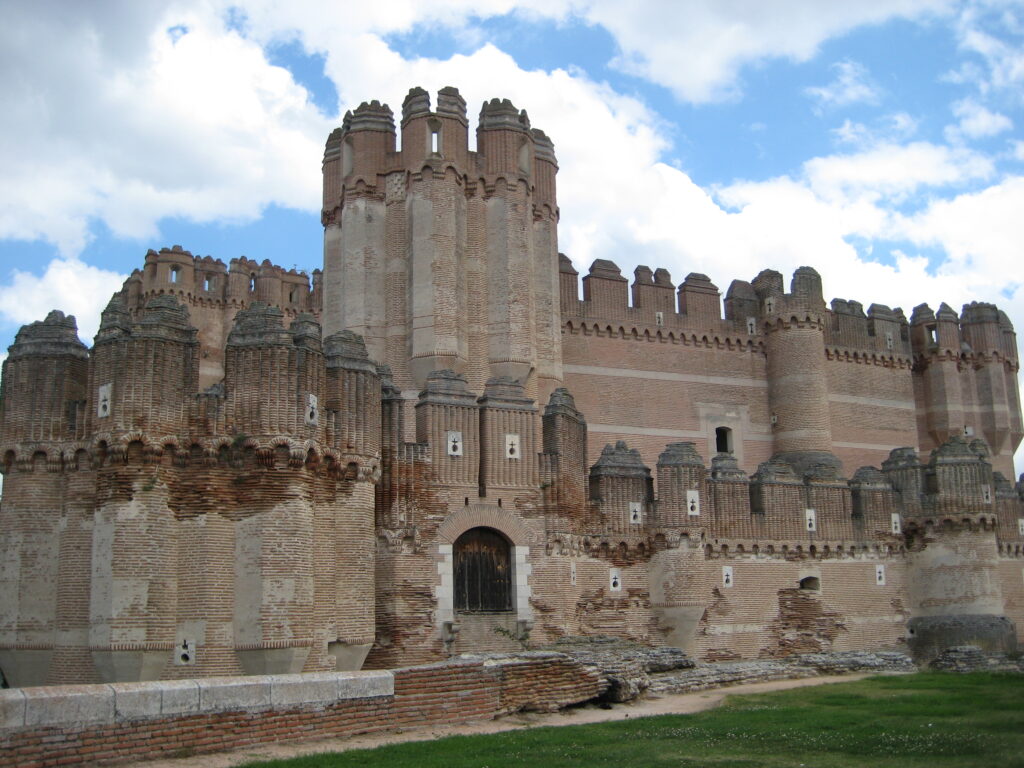 Castle of Coca, Spain, Mudejar brickwork, Gothic architecture, historic monument, cultural heritage, tourism, travel, vacation, destination,